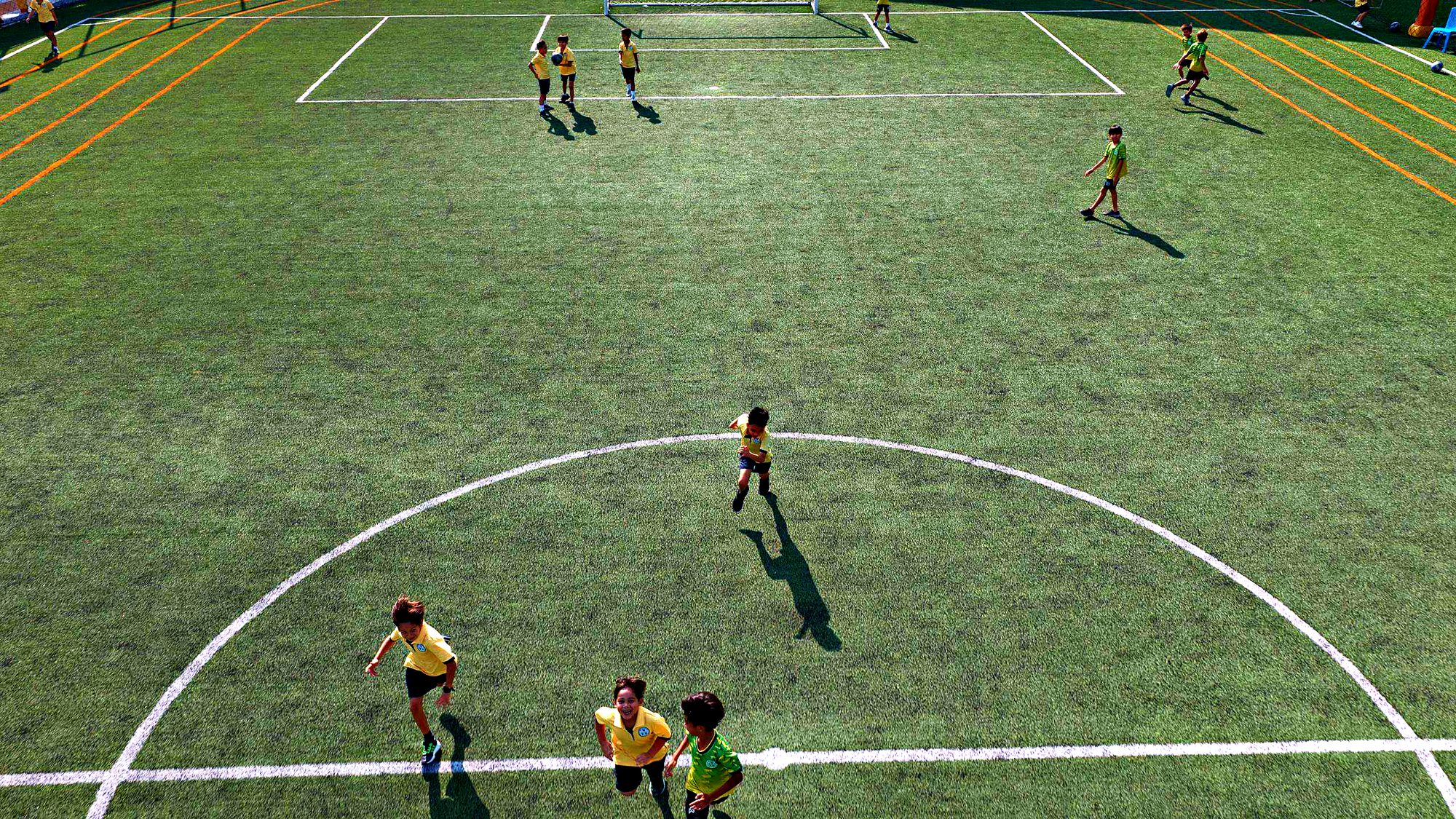 Students in a football match, seen from above