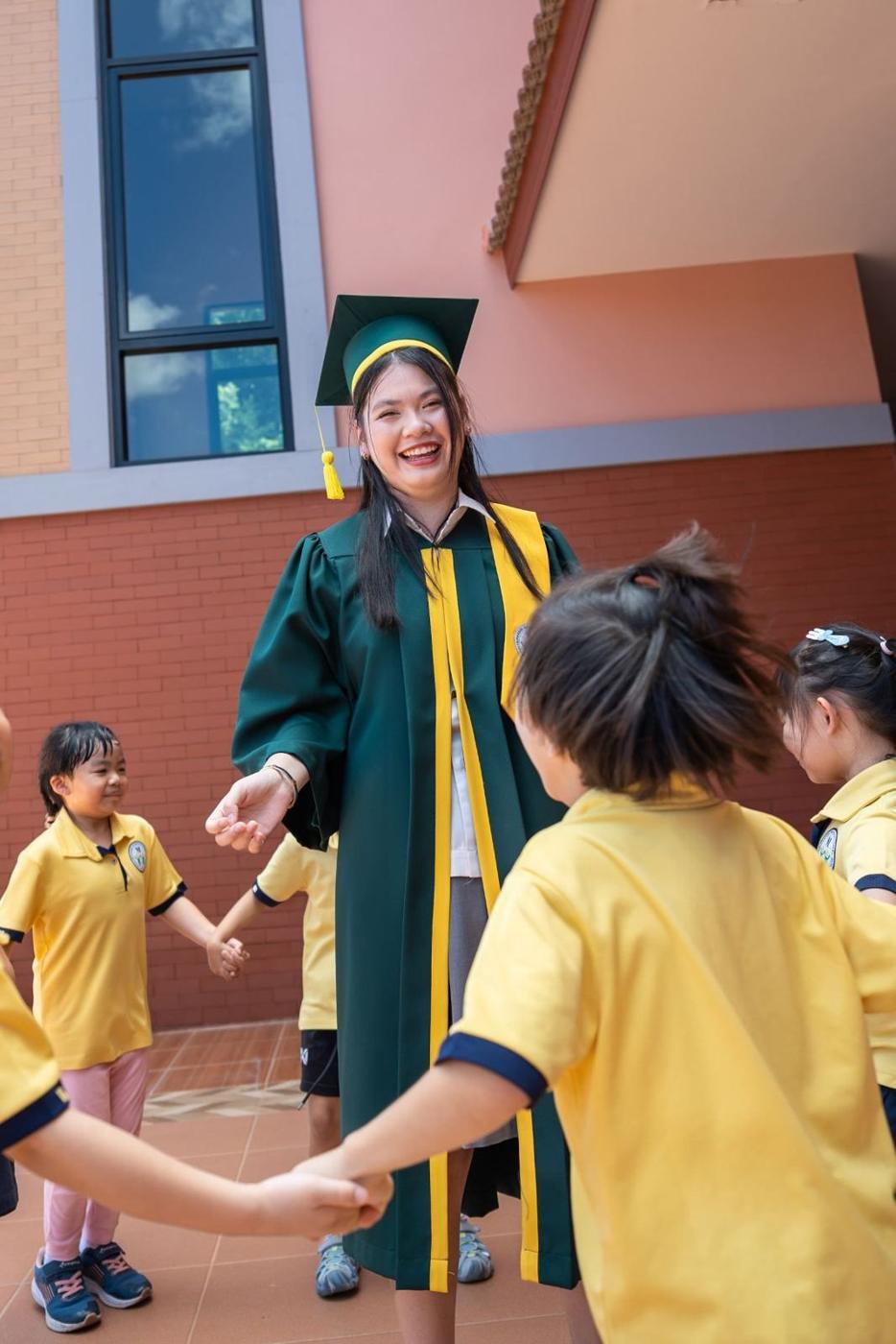 Teacher welcoming a child and parent at drop-off