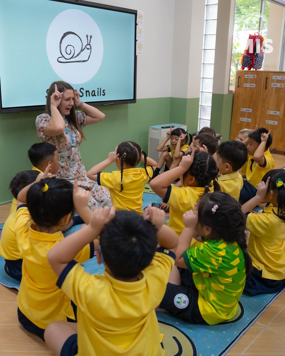 An Early Years teacher with her class