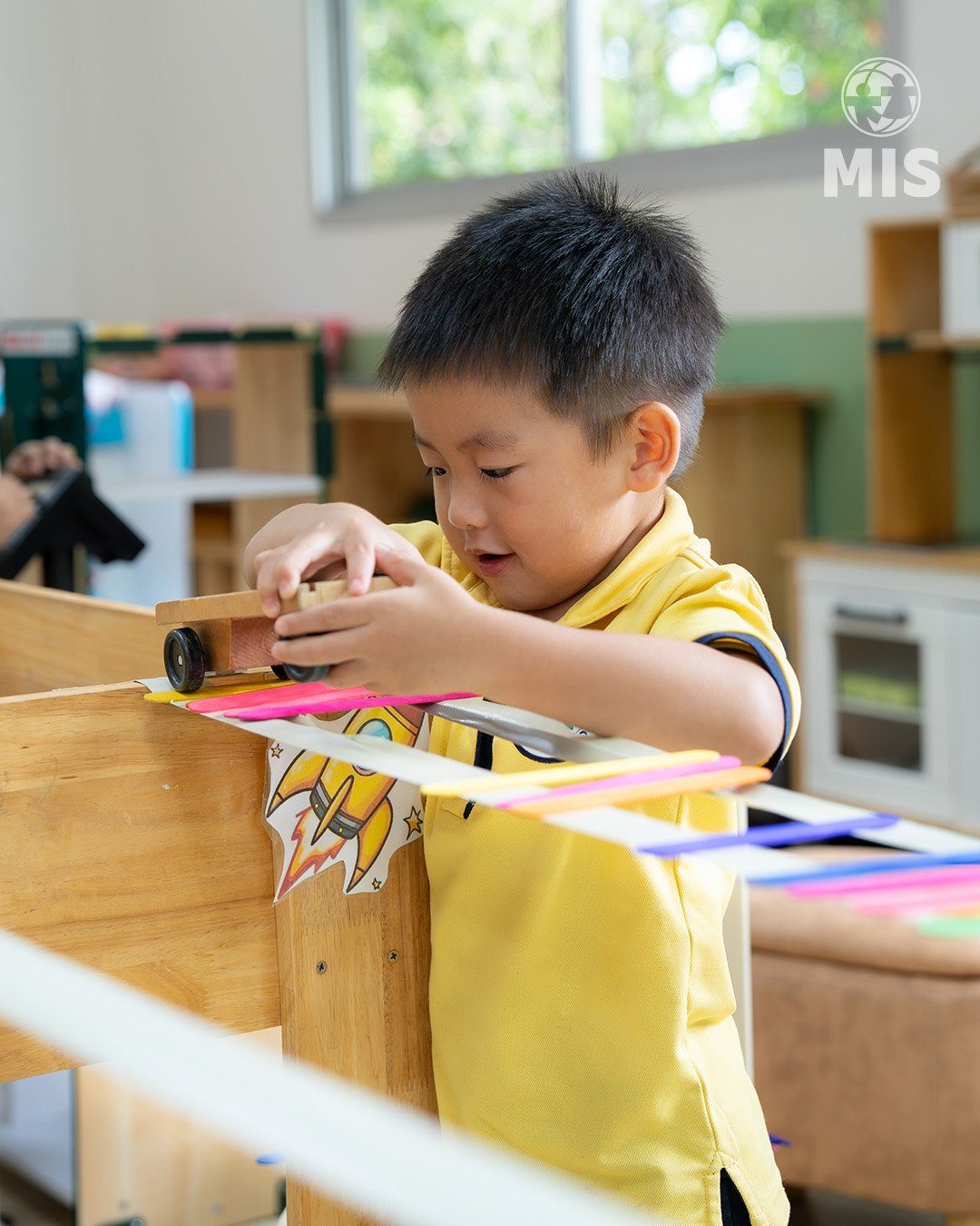 Kindergarten child doing phonics