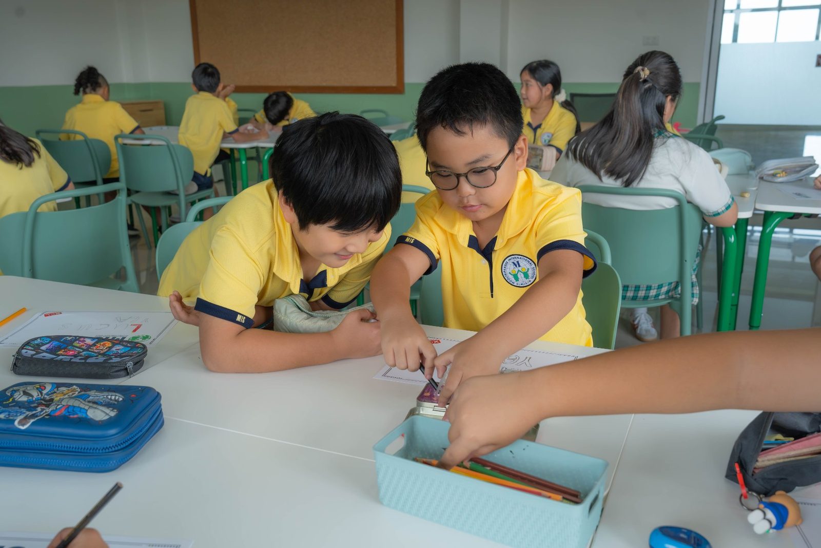 Students sketching designs